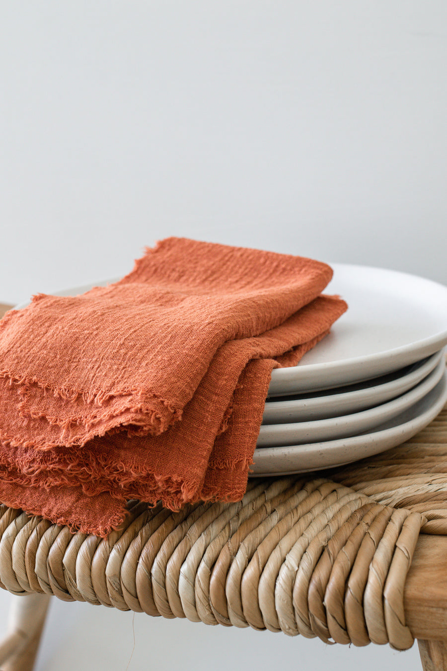 burnt orange terracotta frayed cotton napkins table linen