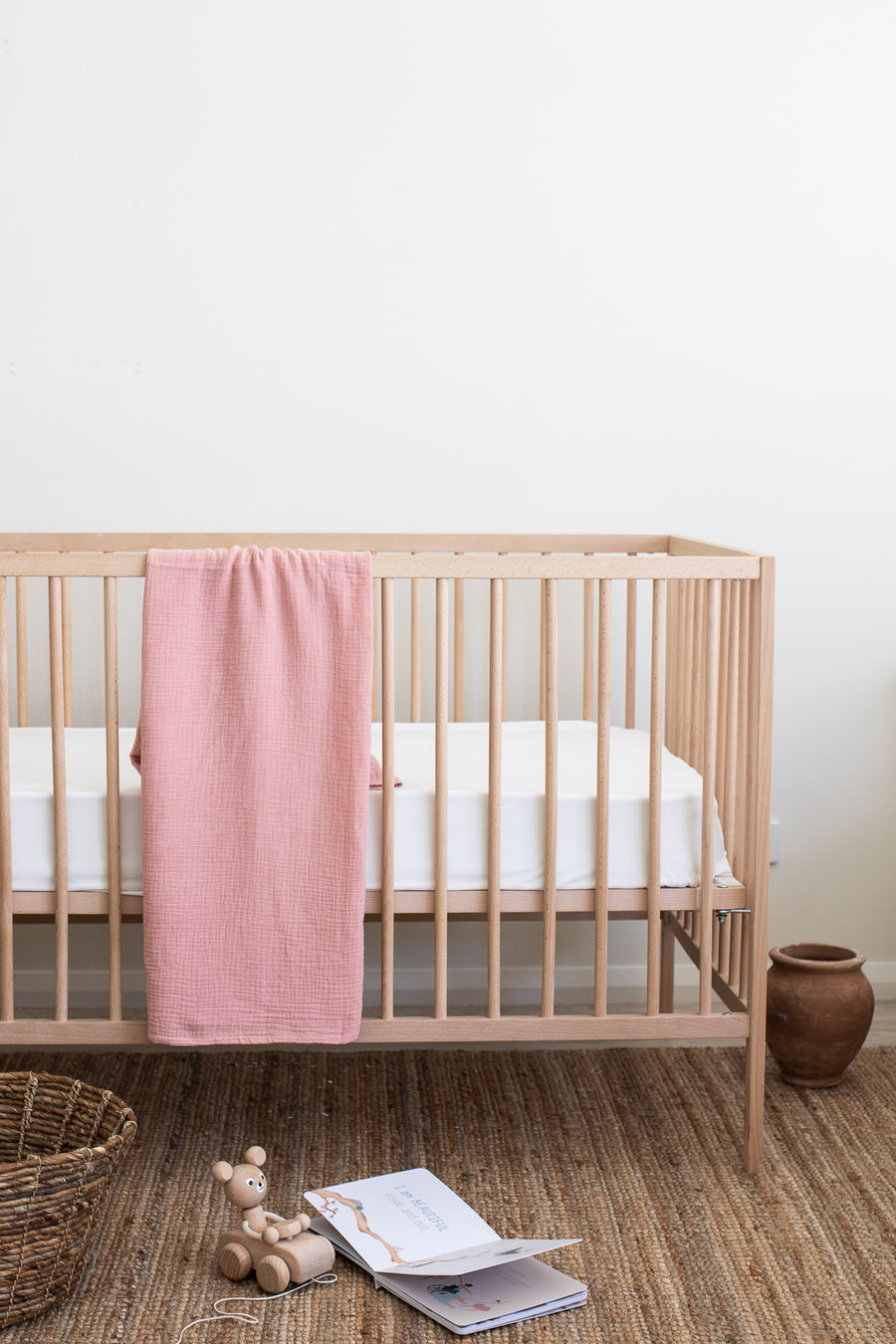soft pink muslin baby swaddle