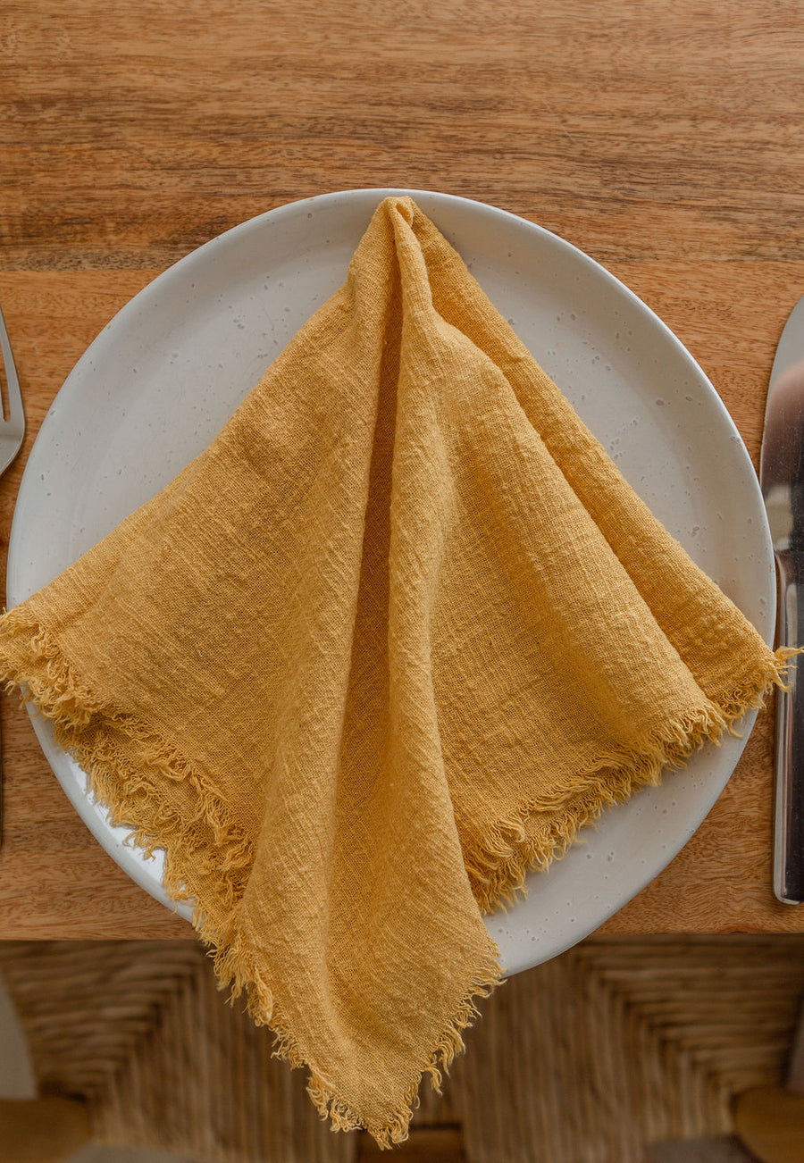 mustard frayed napkin