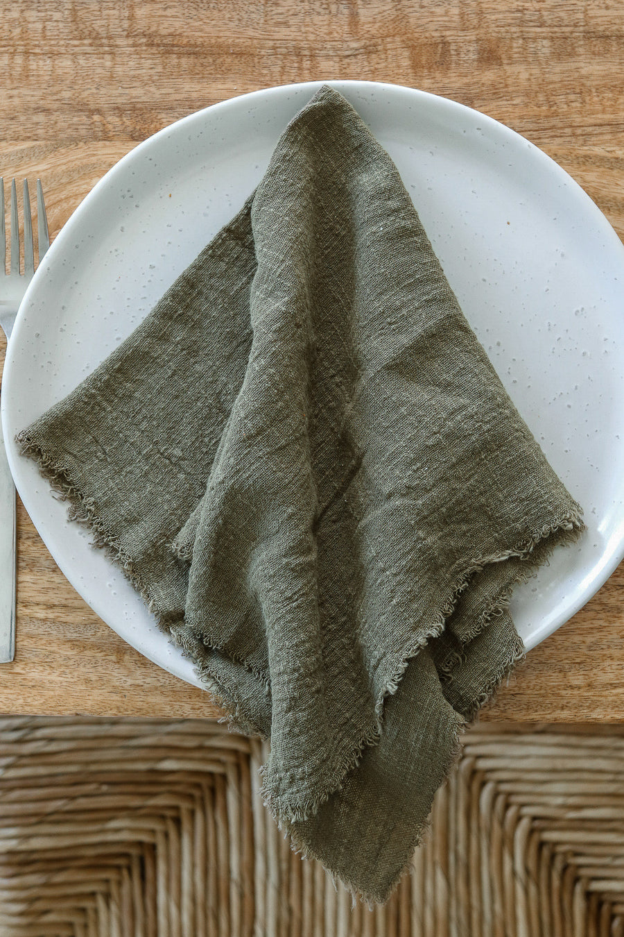 olive frayed napkin