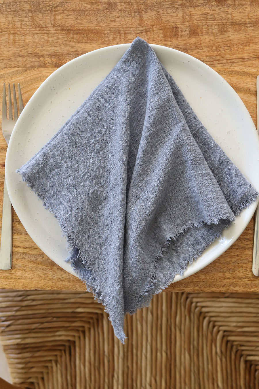 slate blue frayed napkin