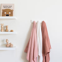 soft pink muslin baby swaddle